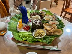 -沐毫傣泐云南菜孔雀宴•手抓饭傣味烧烤(曼听公园店)