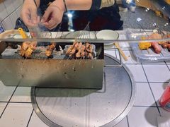 -喜悦小串丹东小黄牛海鲜烧烤大排档(民主广场店)