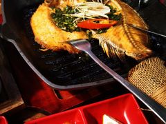 傣族香茅草烤罗非鱼-雀舞云南菜(天津天河城购物中心店)