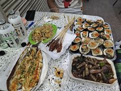 -蚝哥花姐湛江烤生蚝(美丽湾市场店)