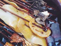 -拈签一笑黄牛肉辣卤串串