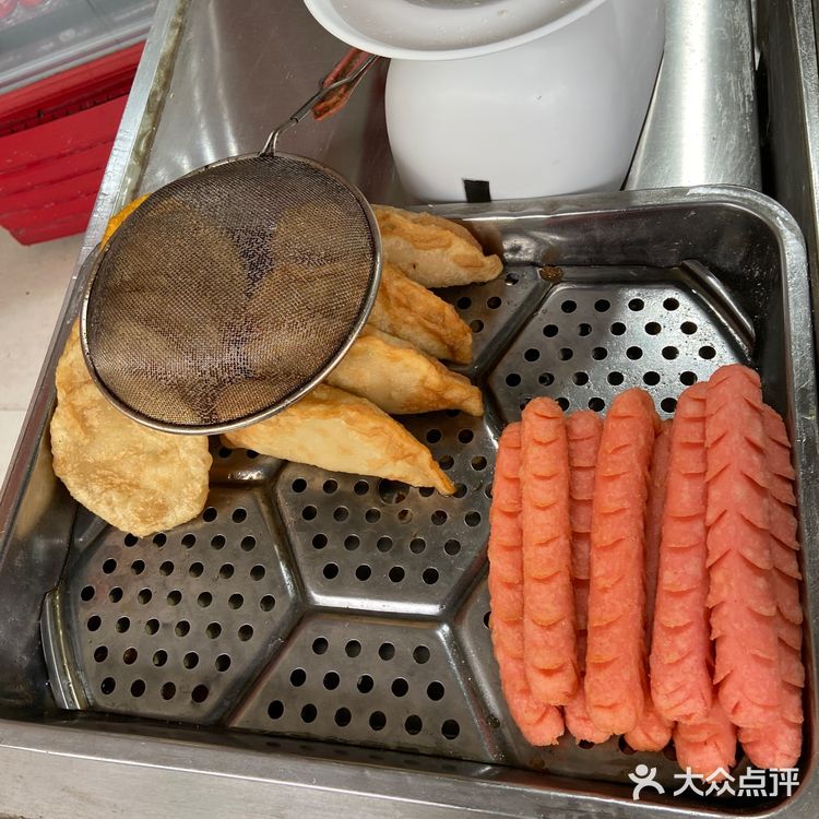 疫情防控就近吃烧饼。