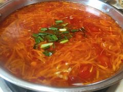 -黄利砖万峰林布依特色酸笋牛肉馆