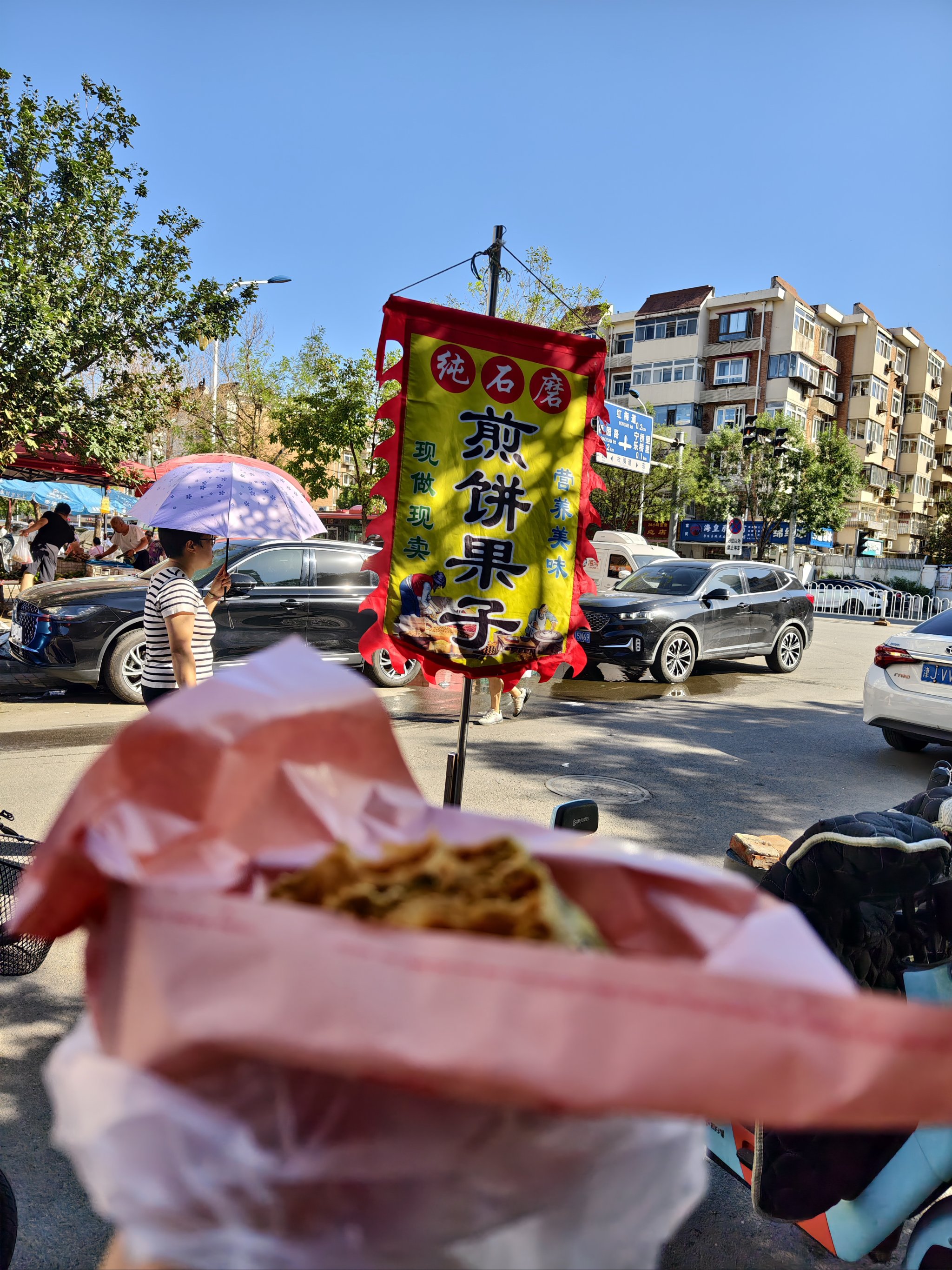 天津煎饼果子摊位图片