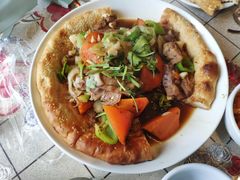 新疆风味馕包肉-新疆儿子娃娃餐厅(锦华街店)