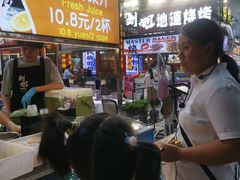 -刘姐啤酒鱼民族演艺餐厅(西街总店)