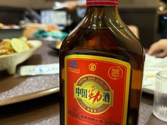 -曼听小寨海鲜烧烤·大连辣炒大王(盖州街店)