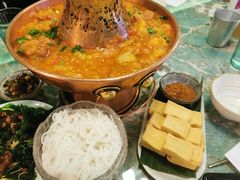 土司铜锅油焖鸡-浩海火烧云傣家菜(京广店)