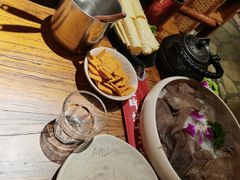 -老牌坊云南鱼豆花火锅(哈西万达店)