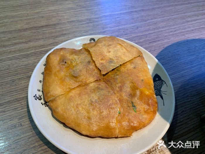 肖四女乐山跷脚牛肉(文峰广场店)牛肉饼图片