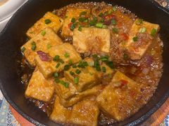 普洱茶炒包浆豆腐-云海肴·汽锅鸡·云南代表菜(天山百盛优客店)