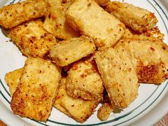 香煎石屏豆腐-云海肴·汽锅鸡·云南代表菜(天山百盛优客店)