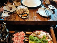 -老牌坊云南鱼豆花火锅(哈西万达店)