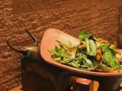 包烧野生牛肝菌-云海肴·汽锅鸡·云南菜(天山百盛优客店)