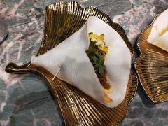 藠头洋芋丝饵块-浩海火烧云傣家菜(京广店)