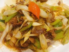 葱爆羊羔肉-巴扎美食·新疆菜·西域歌舞表演餐厅(新疆大厦店)