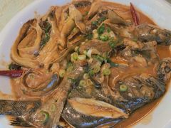 家焖杂拌鱼-日月昇海鲜码头(开发区五彩城店)
