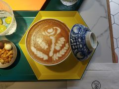 盖碗拿铁-茶是一枝花泡茶店