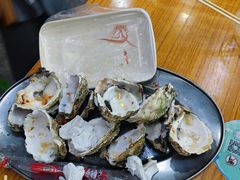 -蚝哥花姐湛江烤生蚝(美丽湾市场店)