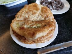 锅盔-周老三跷脚牛肉·全牛火锅(非遗传承店)