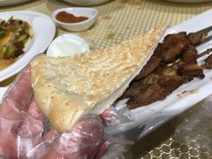 馕坑芝麻馕-巴扎美食·新疆菜·西域歌舞表演餐厅(新疆大厦店)