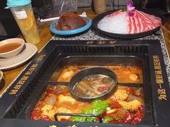-老牌坊云南鱼豆花火锅(哈西万达店)