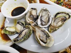 生吃生蚝-阿杰臻选海鲜饭店(普陀山店)