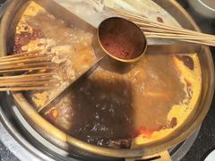 -明何记涮牛肚(品牌首店隋唐植物园南门古城路店)