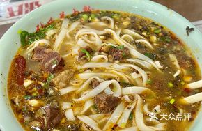 Spicy Braised Lamb with Fresh Noodles