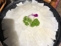 -老牌坊云南鱼豆花火锅(哈西万达店)