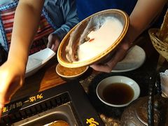-老牌坊云南鱼豆花火锅(哈西万达店)