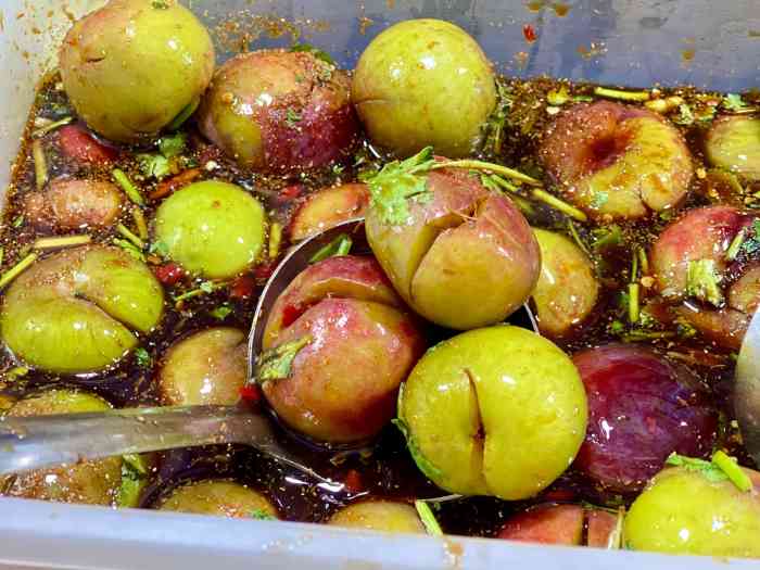 阿姆手荚李果-"这家酸野在平西夜市街路口有三角梅顶的那.