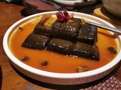 猴头菇鲍汁瑶柱扒制黑豆腐-肴约·花园式餐厅(湖里店)