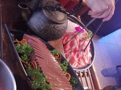 -老牌坊云南鱼豆花火锅(哈西万达店)