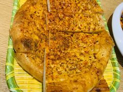 新疆烤馕饼-赛丽麦·牛肉面·美食博物馆(首经贸店)
