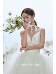 -雪中彩影婚纱摄影·微光艺术中心