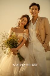 -雪中彩影婚纱摄影·微光艺术中心