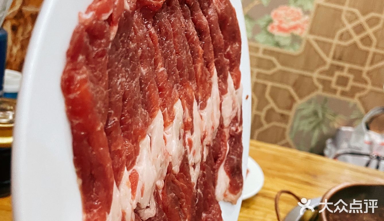 铜锅儿老店，真正倒盘不撒的手切鲜羊肉[6]。