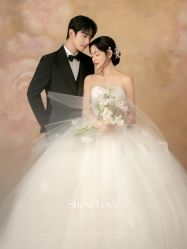 -雪中彩影婚纱摄影·微光艺术中心