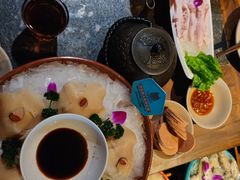 -老牌坊云南鱼豆花火锅(哈西万达店)