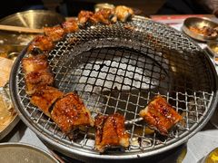 -草家酱蟹炭火烤肉店(珲春南路一店)