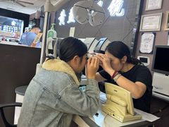 -黄益静眼镜行