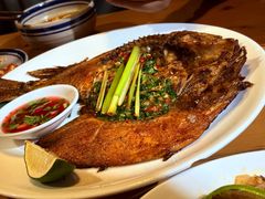 烤罗非鱼-蜗牛的家旅行主题云南菜餐厅.小酒馆(护国寺店)