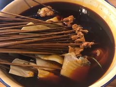-拈签一笑黄牛肉辣卤串串
