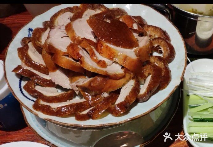 龙聚德北京烤鸭(杨家坪大洋百货店)烤鸭半只图片