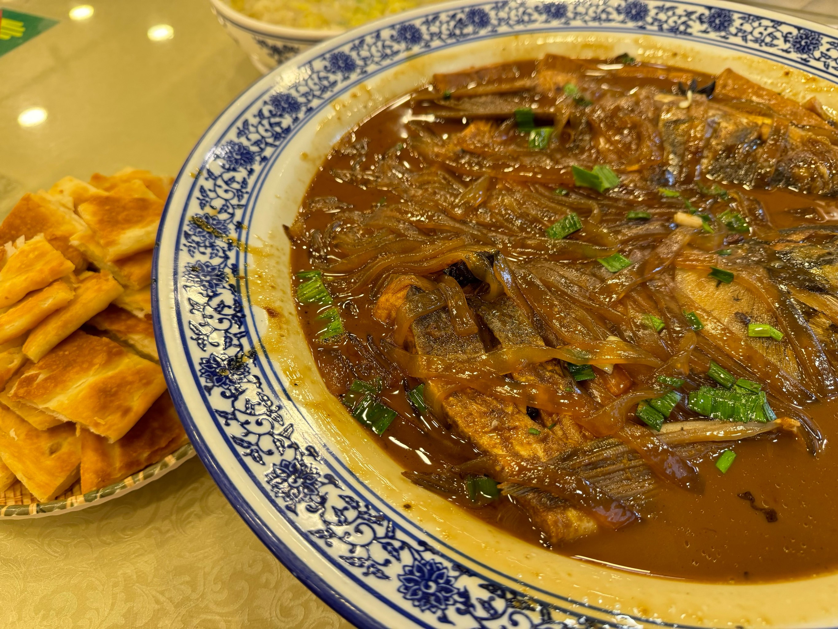 天天饮食2008鱼头泡饼图片