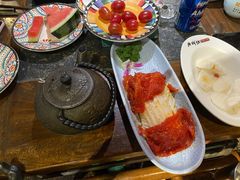 -老牌坊云南鱼豆花火锅(哈西万达店)
