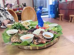 -沐毫傣泐云南菜孔雀宴•手抓饭傣味烧烤(曼听公园店)