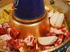 -毛辣果·贵州红酸汤牛肉火锅(西单店)