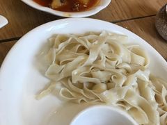 沙湾大盘鸡-西域盛宴烧烤新疆菜清真餐厅(古美店)